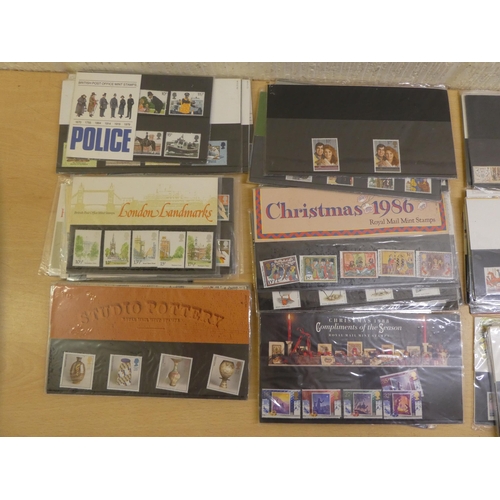 10 - Uncollated, unused postage stamp presentation packs