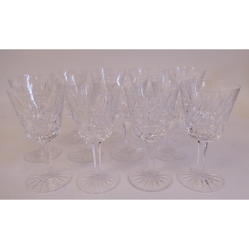 100 - Twelve Waterford crystal Lismore pattern pedestal wines