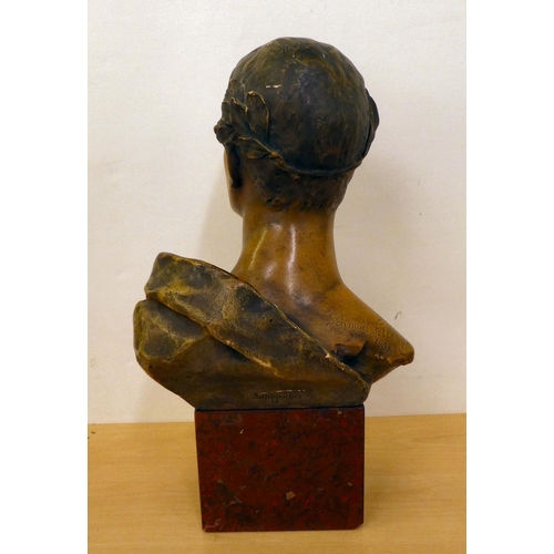 126 - A 20thC bronze effect, cast metal traditional bust, after Schmitt Felling, on a plinth  15