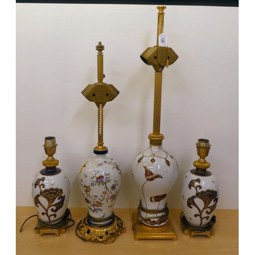 128 - Four table lamps, decorated in individual taste  some bearing continental marks  largest 14