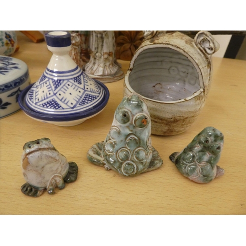 130 - A mixed lot: to include studio pottery and Asian carved wooden items  mixed sizes 