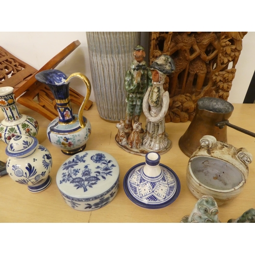 130 - A mixed lot: to include studio pottery and Asian carved wooden items  mixed sizes 