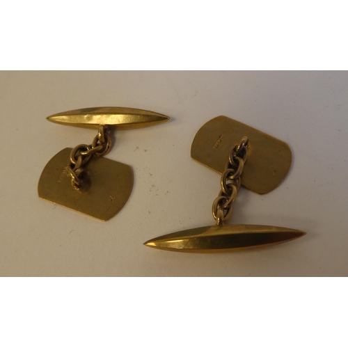 144 - Items of personal ornament, viz, three yellow metal shirt studs  stamped 18ct; an 18ct gold signet r... 