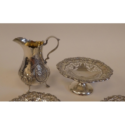 151 - Silver items: to include shallow dishes; and a cream jug  mixed marks 