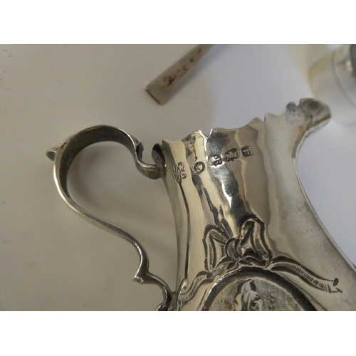 151 - Silver items: to include shallow dishes; and a cream jug  mixed marks 