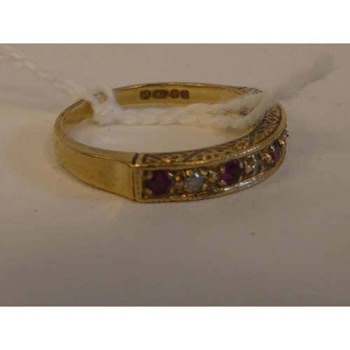 157 - A 9ct gold ruby and diamond set half eternity ring 