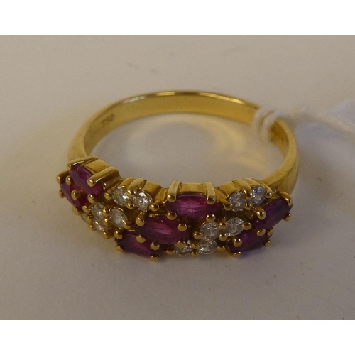 160 - An 18ct gold ruby and diamond set ring 