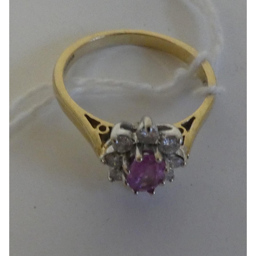 164 - An 18ct gold pink sapphire and diamond set ring 