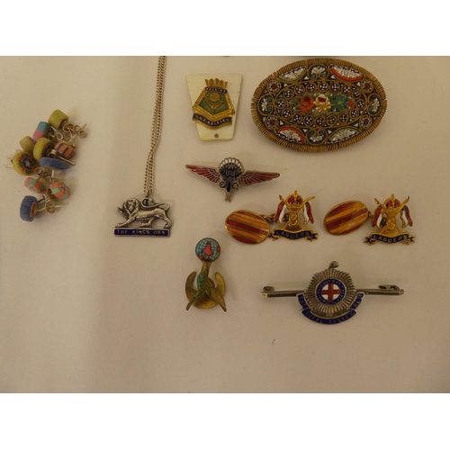 166 - A mixed lot: to include a yellow metal micro mosaic brooch