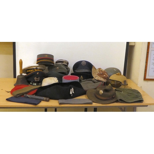 171 - Military hats and caps, mostly replicas: to include a Bundeswehr Luftwaffe officer's cap(Please Note... 