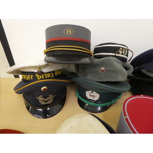 171 - Military hats and caps, mostly replicas: to include a Bundeswehr Luftwaffe officer's cap(Please Note... 