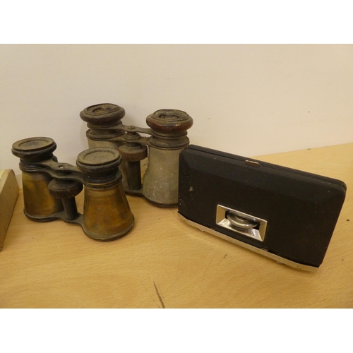 176 - Military collectables: to include a cast metal shot flask(Please Note: this lot is subject to the st... 