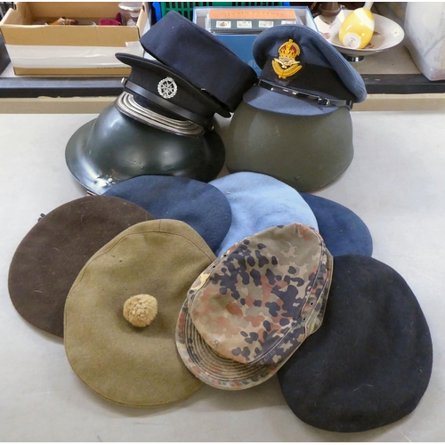 179 - Military hats and caps, mostly replicas: to include a RAF cap(Please Note: this lot is subject to th... 