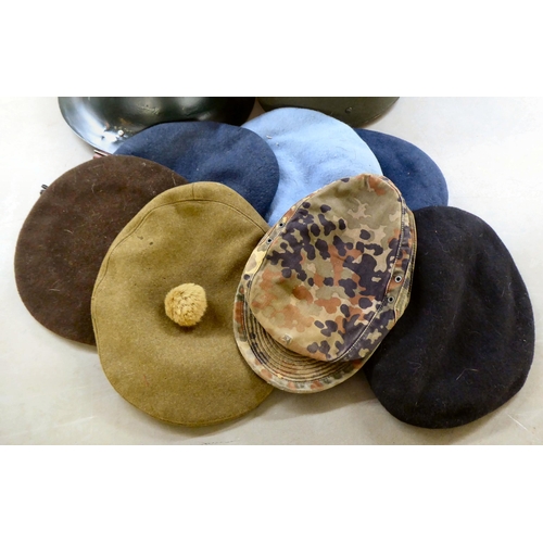 179 - Military hats and caps, mostly replicas: to include a RAF cap(Please Note: this lot is subject to th... 