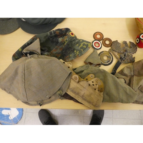 181 - Military hats and caps, mostly replicas: to include German examples(Please Note: this lot is subject... 