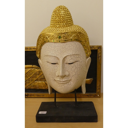 182 - A modern overpainted bust, a smiling Buddha  23