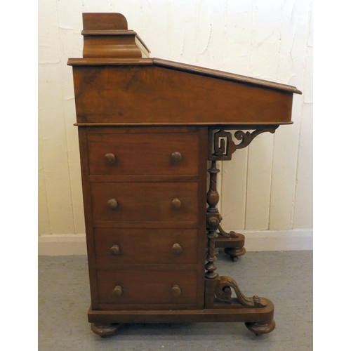 197 - An Edwardian walnut and mahogany Davenport with a hinged top and a galleried compartment, over a ban... 