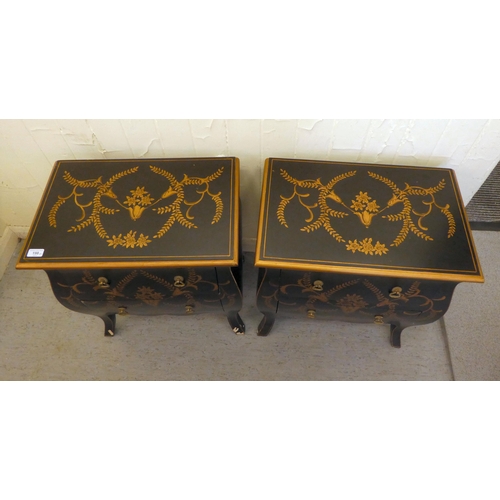 198 - A pair of modern black painted and gilt stencilled two drawer bedside chests, raised on splayed legs... 