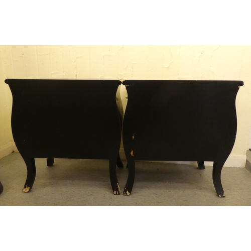 198 - A pair of modern black painted and gilt stencilled two drawer bedside chests, raised on splayed legs... 