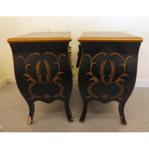 198 - A pair of modern black painted and gilt stencilled two drawer bedside chests, raised on splayed legs... 