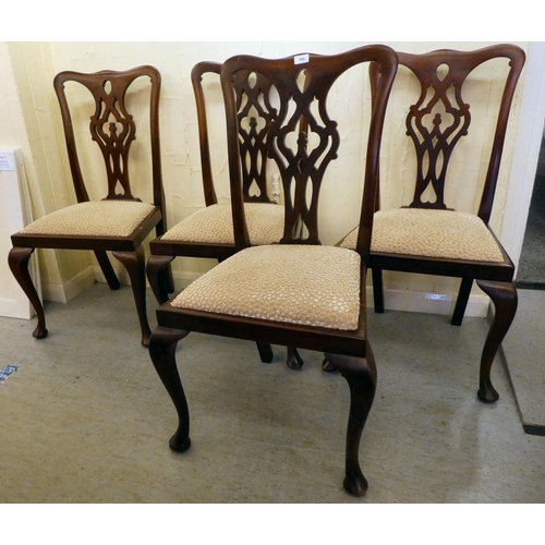 199 - A set of four early 20thC Chippendale design mahogany framed dining chairs with later fabric upholst... 