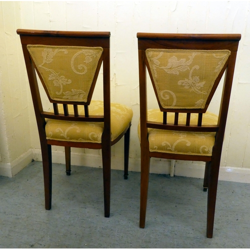 200 - A pair of late 19thC style Continental inspired mahogany and gilt metal mounted hall chairs 