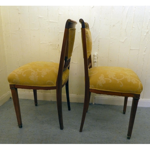 200 - A pair of late 19thC style Continental inspired mahogany and gilt metal mounted hall chairs 