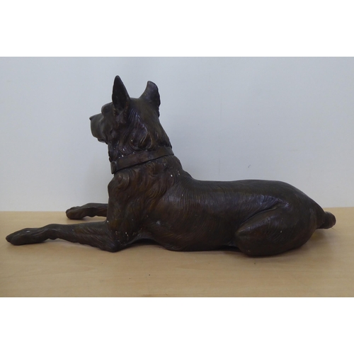 202 - A 20thC cast bronze model, a recumbent hound  11