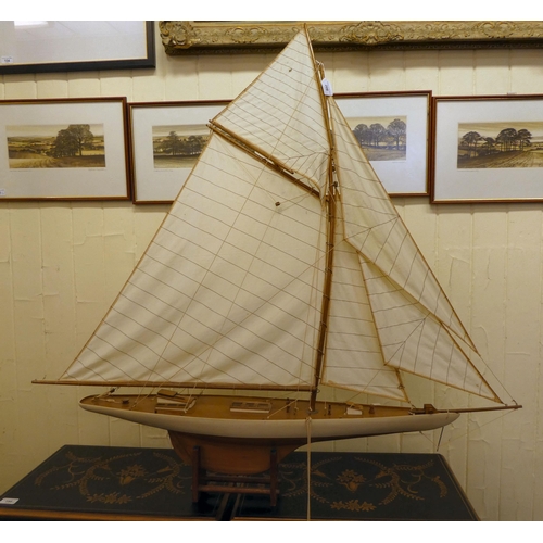 206 - A 20thC scratch built pond yacht, on a stand  46