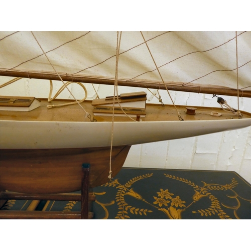 206 - A 20thC scratch built pond yacht, on a stand  46