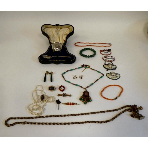 213 - A mixed lot: to include a silver Christening egg cup and spoon; costume jewellery and collectables&n... 