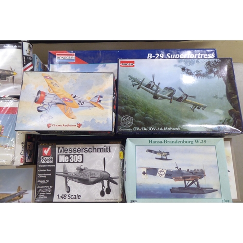 242 - 1/48 scale model kits: to include by Monogram, a 'B-29 Superfortress'; and a 'P-47D Thunderbolt, Arm... 