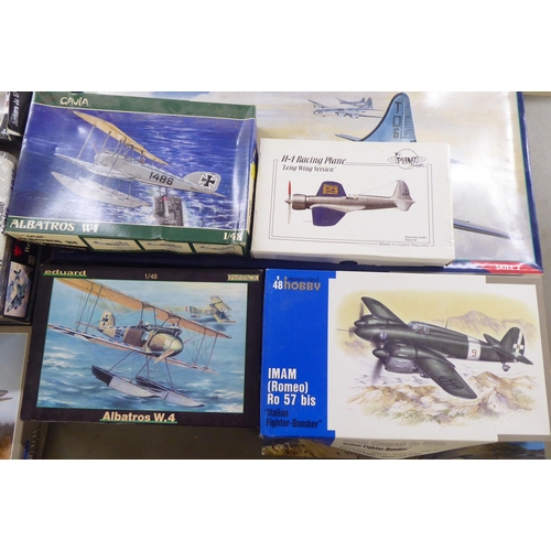 242 - 1/48 scale model kits: to include by Monogram, a 'B-29 Superfortress'; and a 'P-47D Thunderbolt, Arm... 