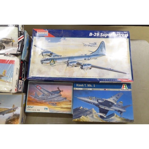 242 - 1/48 scale model kits: to include by Monogram, a 'B-29 Superfortress'; and a 'P-47D Thunderbolt, Arm... 