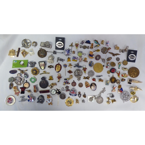 244 - Variously themed badges and pins 