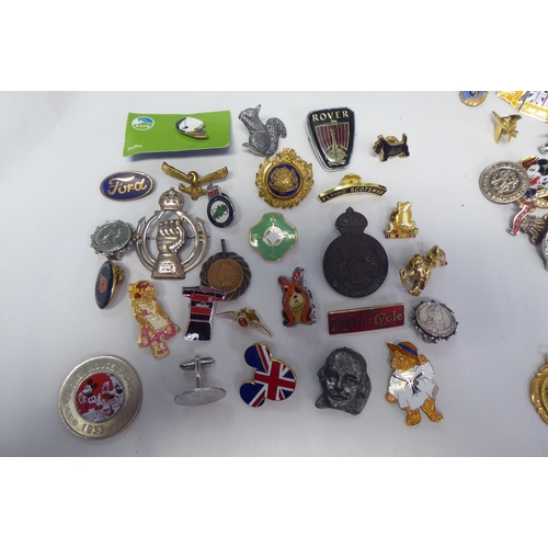 244 - Variously themed badges and pins 