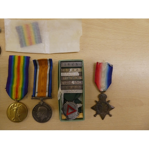 25 - Military and other items of personal ornament: to include Great War period medals, belonging to one ... 