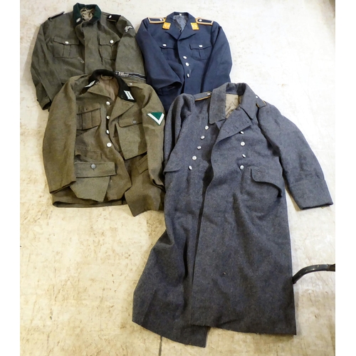 262 - Military uniforms, some copies: to include a German SS jacket(Please Note: this lot is subject to th... 