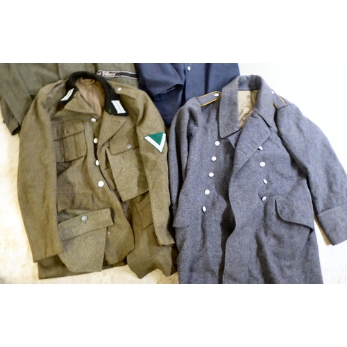 262 - Military uniforms, some copies: to include a German SS jacket(Please Note: this lot is subject to th... 