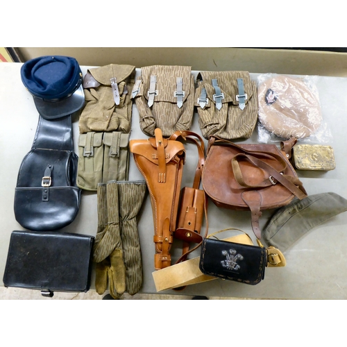 267 - Military collectables: to include a stitched brown hide holster(Please Note: this lot is subject to ... 