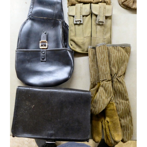 267 - Military collectables: to include a stitched brown hide holster(Please Note: this lot is subject to ... 