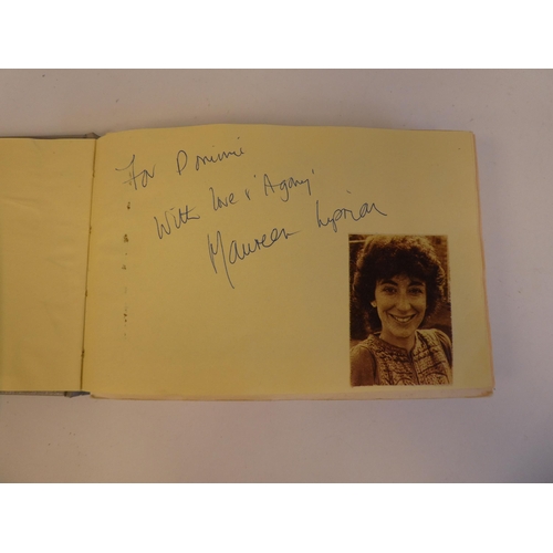 275 - An autograph album, bearing signatures from comedians, magicians, film and TV stars