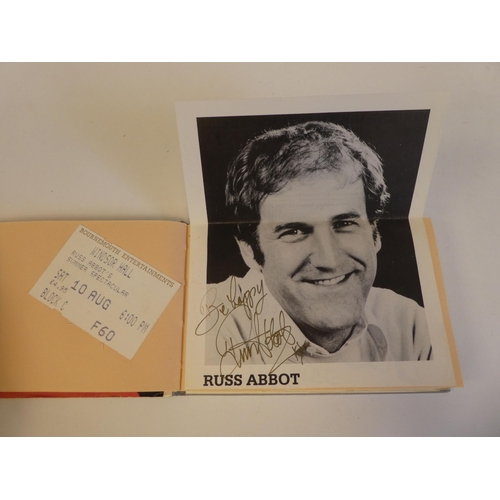 275 - An autograph album, bearing signatures from comedians, magicians, film and TV stars