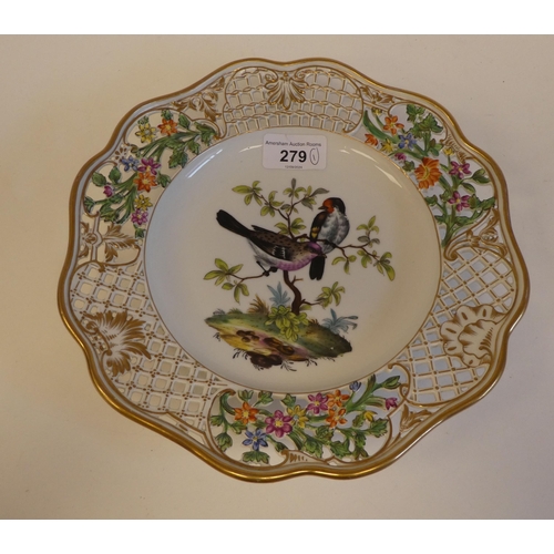 279 - A Continental porcelain plate with pierced lacework style and floral border, decorated with birds&nb... 