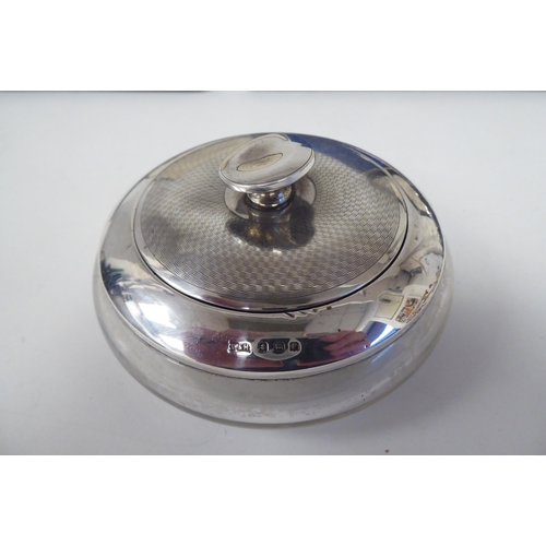 284 - Silver collectables: to include a Walker & Hall silver lidded clear glass powder jar  Birmingham... 