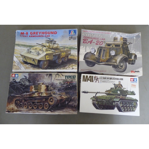 302 - 1/35 scale model kits and terrain: to include by Tamiya, a 'Russian Tank Destroyer SU-122'; and a 'F... 