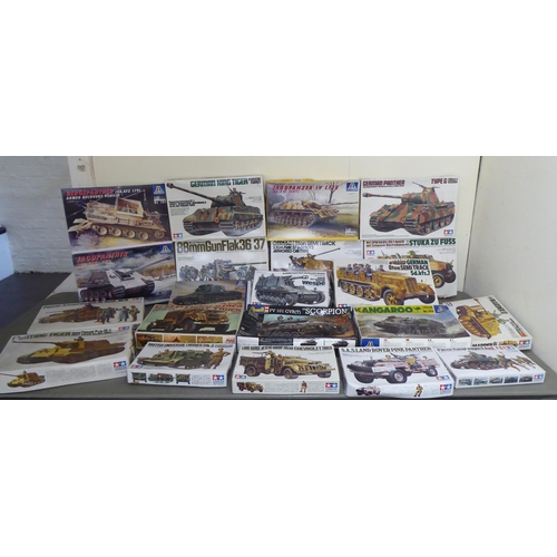 307 - 1/35 scale model kits: to include by Tamiya, a 'British Universal Carrier Mk.II'; and a 'Kangaroo Pe... 