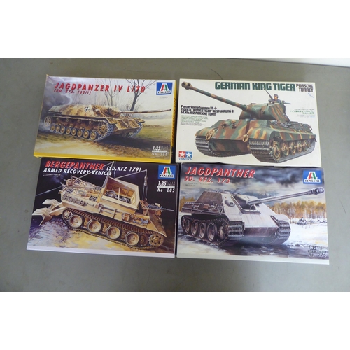 307 - 1/35 scale model kits: to include by Tamiya, a 'British Universal Carrier Mk.II'; and a 'Kangaroo Pe... 