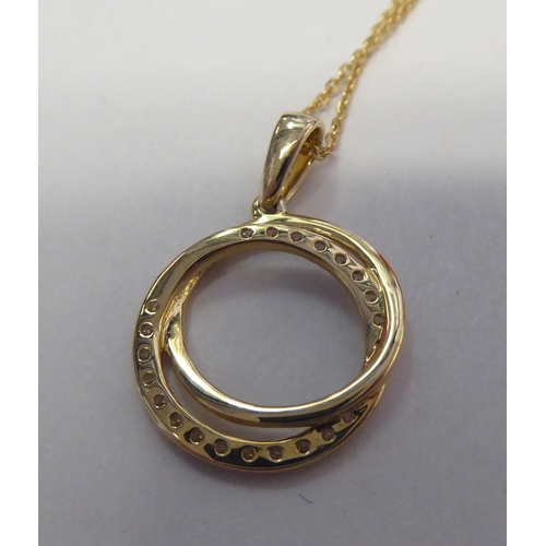 315 - A 9ct gold, diamond set, halo style necklace, on a fine neckchain