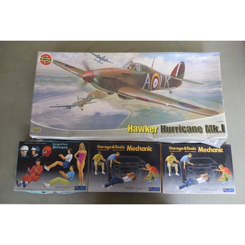 323 - 1/24 scale model kits: to include by Revell, a 'Ferrari F310B'; and a 'Hawker Hurricane Mk.I' by Air... 